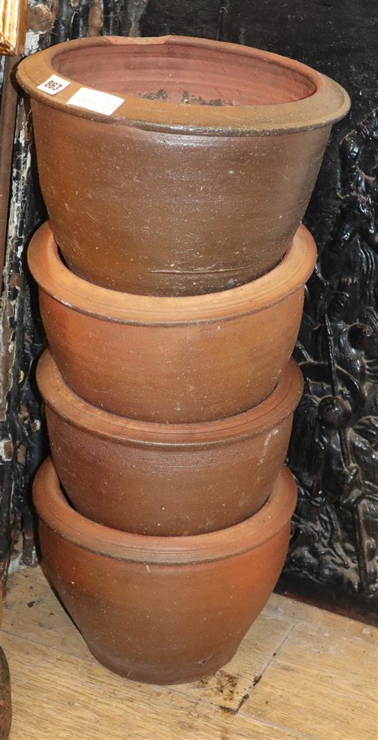 Four glazed earthenware garden planters Diam.33cm